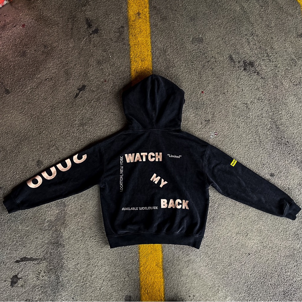 Black Hoodie with Bold Text Graphics